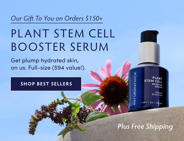 Full-size Plant Stem Cell Booster Serum on Stone platform with flower